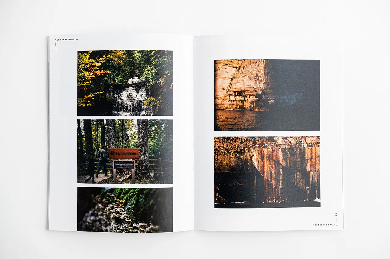 A visual journal laying open to images of rock and forest landscapes.