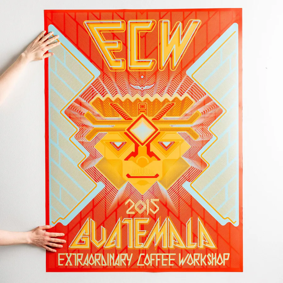 Two hands holding a poster with custom artwork in red, orange and light green.