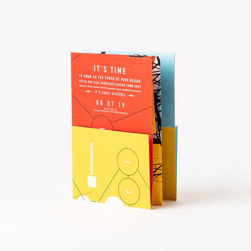 A folded direct mail with a yellow, red and blue design and printed with It's Time on the front.