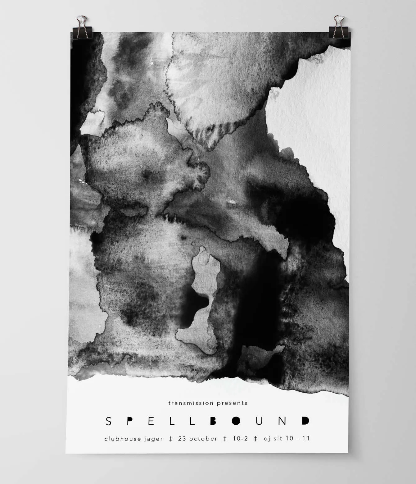 A event poster printed with an abstract design in shades of gray and Spellbound at the bottom.