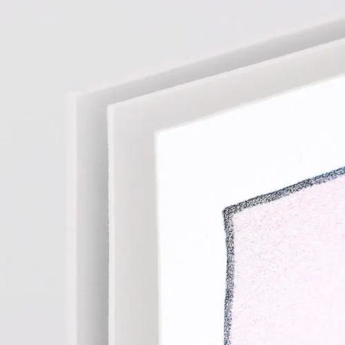 Cardstock Thickness Options The corners of two cardstock signs lined up next to each other with different thicknesses.