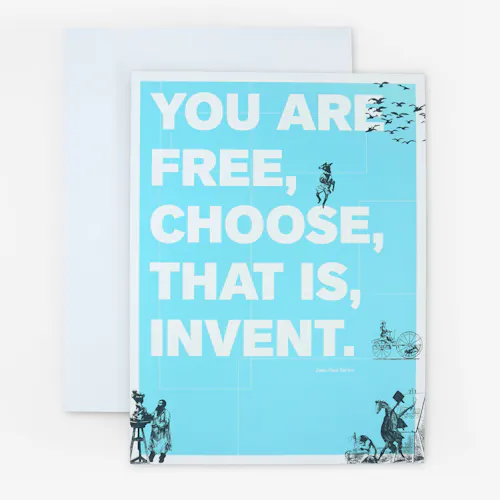 A honeycomb cardboard sign printed with a blue background and You Are Free, Choose, That is Invent.