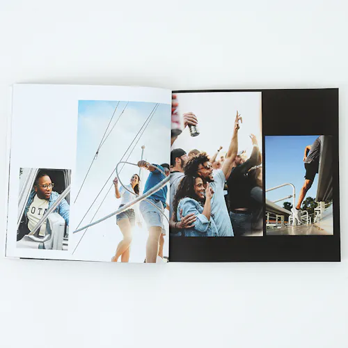 ©Roy Son Photo A booklet printed with photography of a man driving a car, two people on a boat and concertgoers.