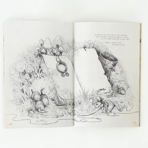 A sketchbook laying open to illustrations of a blank notebook sitting among grass, mushrooms and mice.