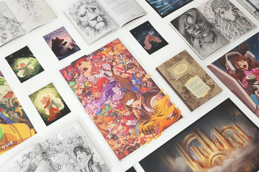Posters, booklets and postcards lined up in rows with custom fantasy and anime artwork.