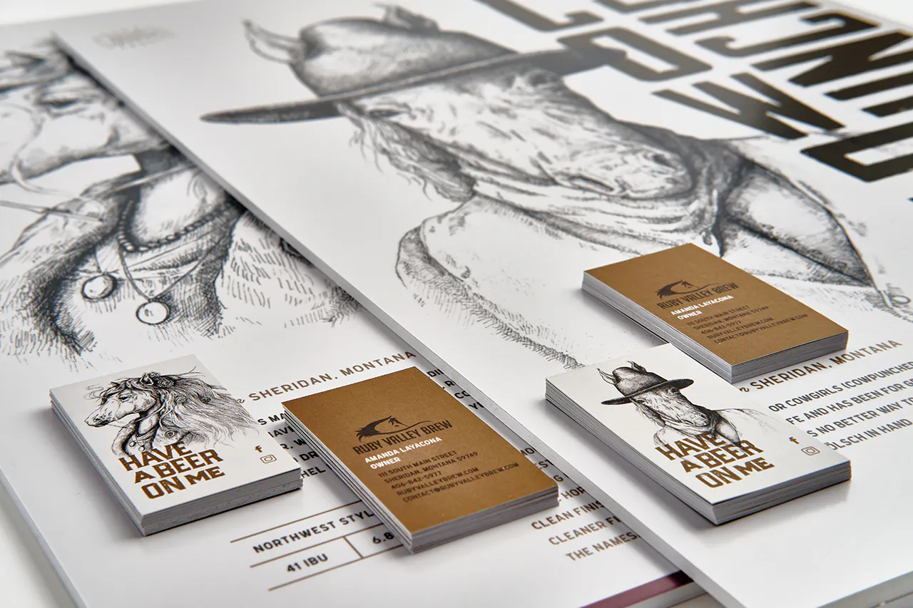Marketing posters and business cards for Ruby Valley Brew printed with black and white horse graphics.