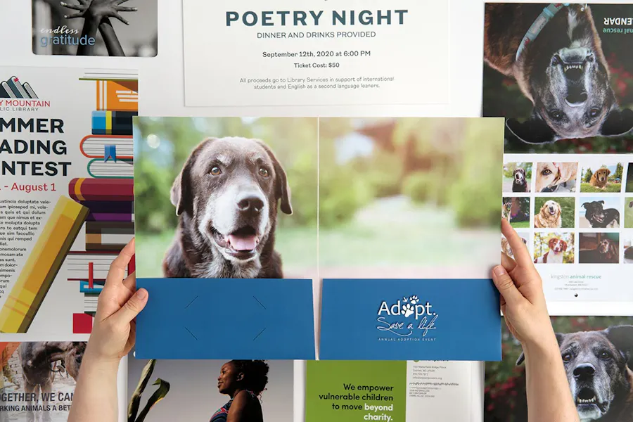 An array of print marketing materials for nonprofits, including custom pocket folders, calendars, posters and booklets.