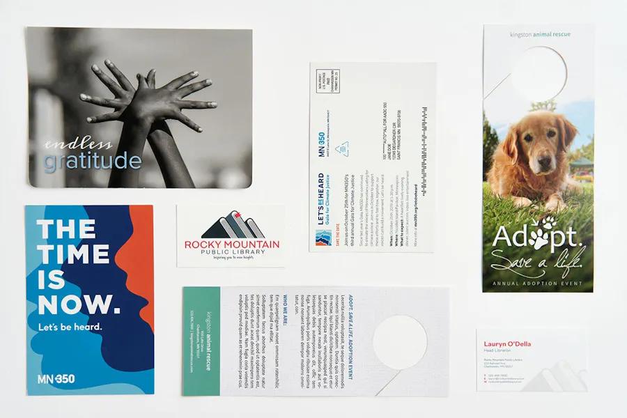 Print marketing pieces for a charity organization, including direct mail, business cards and door hangers.