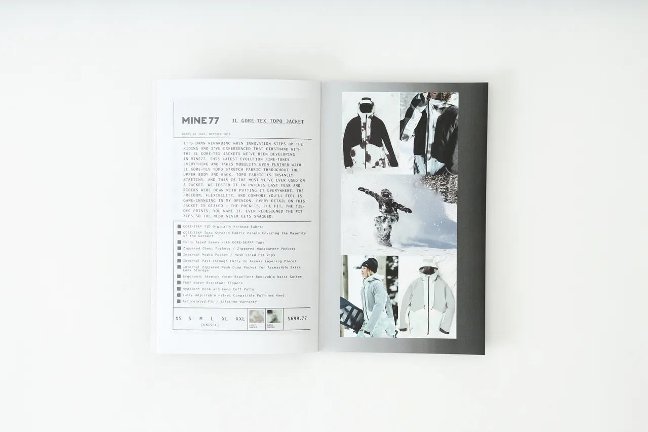 A Mine77 lookbook laying open to images of a snowboarding jacket and details about it.