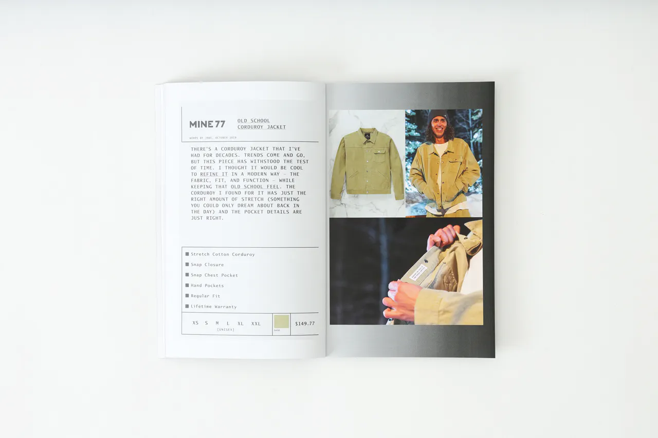A Mine77 lookbook laying open to images of a corduroy jacket and details about it.