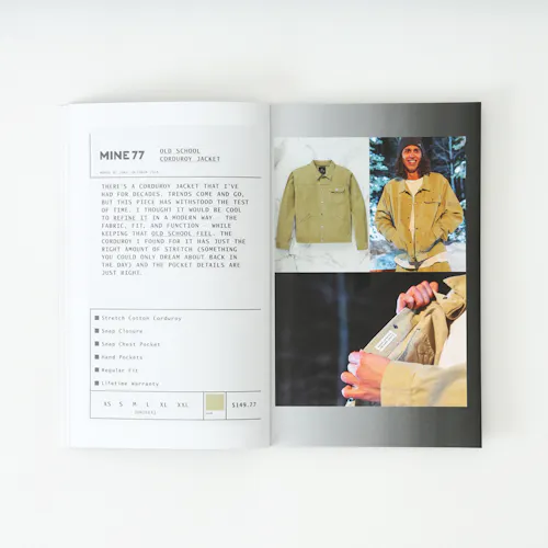 A Mine77 lookbook laying open to images of a corduroy jacket and details about it.