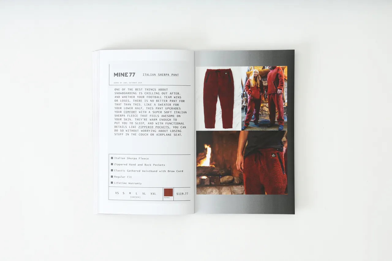 A Mine77 lookbook laying open to images of sherpa pants and details about them.