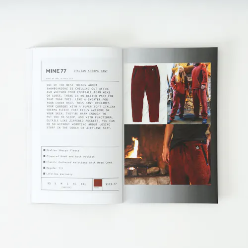 A Mine77 lookbook laying open to images of sherpa pants and details about them.