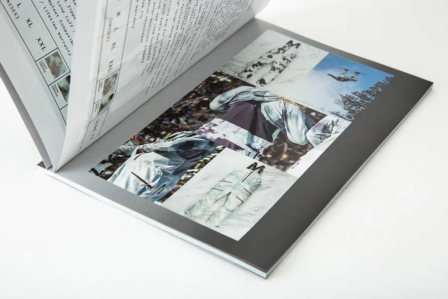The Burton Mine77 product lookbook laying open to product details and images.