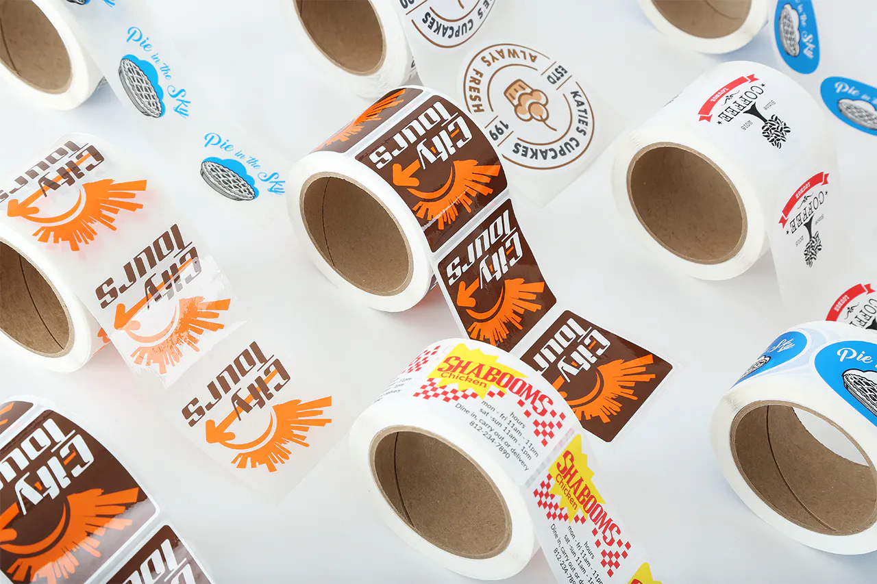 Custom rolls labels printed with branding for City Tours, Shabooms, Katie's Cupcakes and Pie in the Sky.