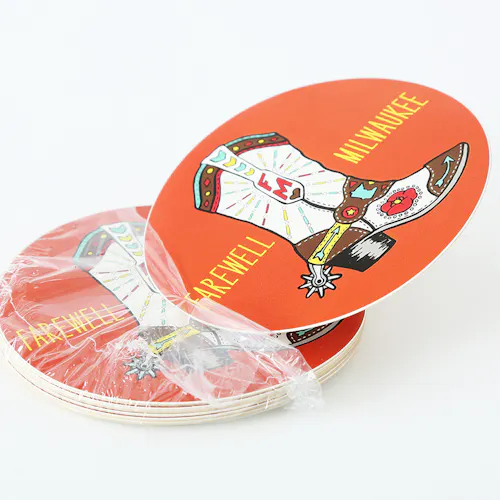 White Polypropylene - Removable, 3.5 x 3.5", Die Cut Single with Shrink Wrapping A stack of round stickers custom printed with an orange background, cowboy boot and Farewell Milwaukee in yellow.