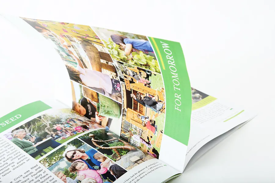 An annual report booklet laying open to images of kids doing outdoor activities.