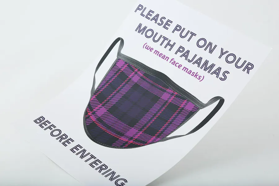 A custom poster printed with a safety mask with a plaid pattern and Please Put On Your Mouth Pajamas at the top.