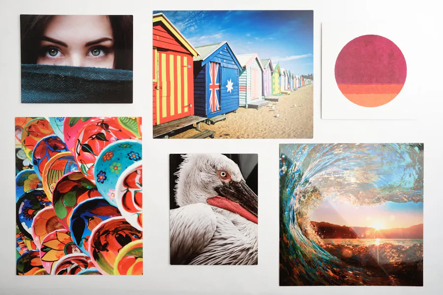 Six metal prints in various sizes showing a variety of artwork.