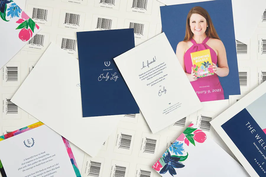 A collage of custom stationery pieces overlapping each other.