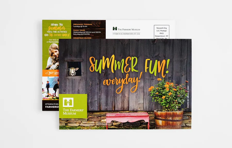 Two summer marketing direct mailers overlapping each other.