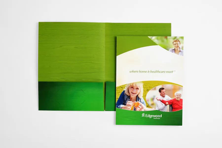 Two custom pocket folders designed for a senior living facility in green, white, red and blue.