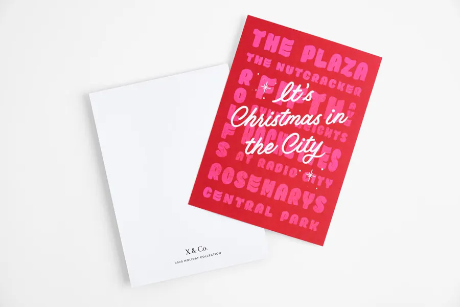 Two holiday greeting cards overlapping each other with a pink, red and white design.