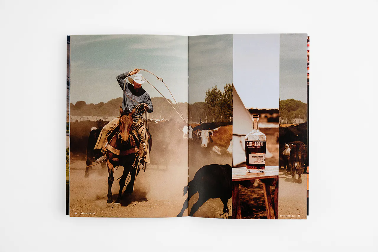 A marketing booklet laying open to images of a man roping cattle and a bottle of whiskey.