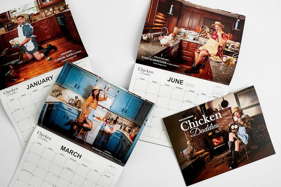 Saddle stitch calendars open to different months.