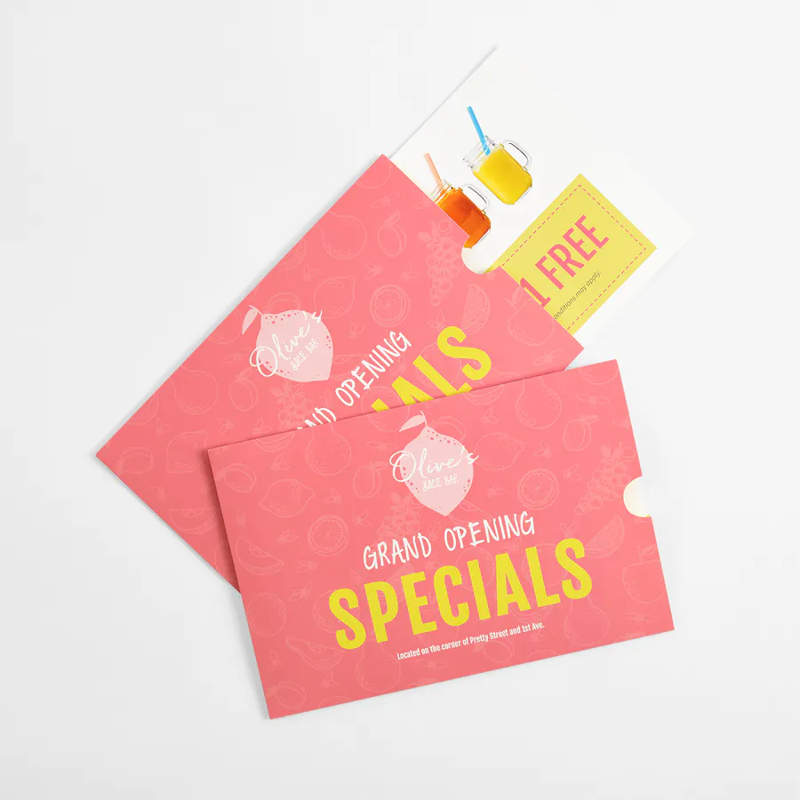Two pink sleeve mailers with Grand Opening Specials on the front and a white insert card.
