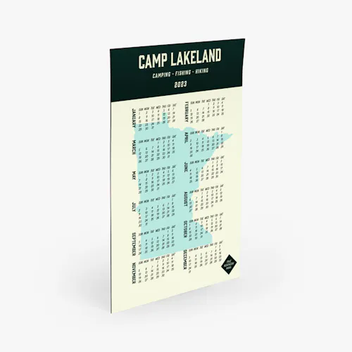 A magnetic calendar printed with Camp Lakeland, 12 months and a Minnesota design in blue.