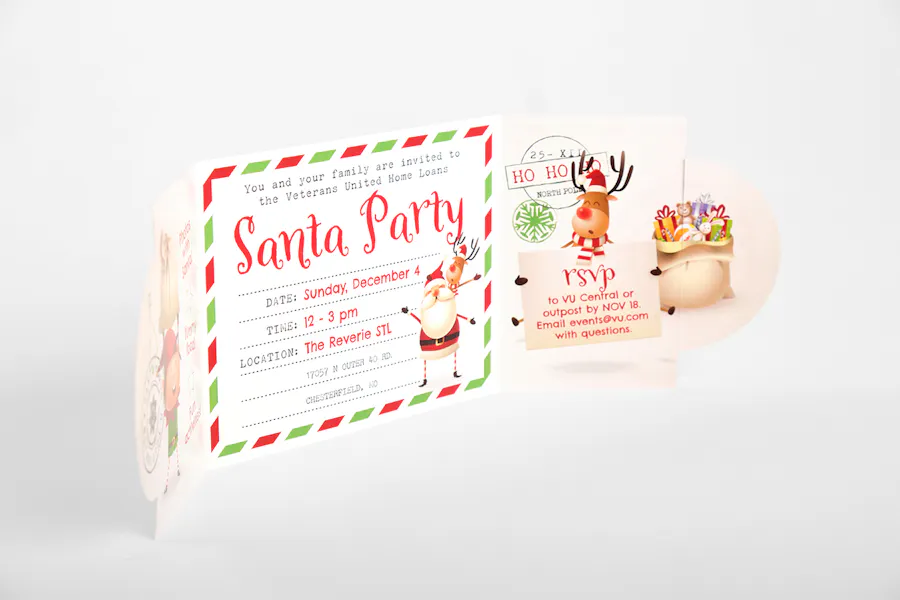 A holiday invitation with a gate fold printed with party details on the inside and illustrations of Santa and reindeer.