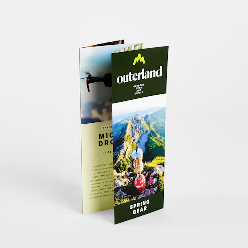 An accordion brochure standing and printed with Outerland Outdoor Gear and Supply.