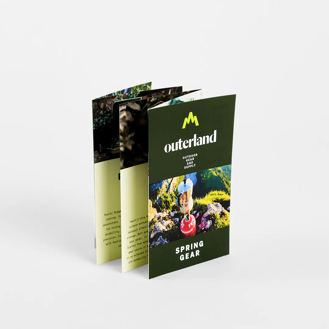 A custom brochure printed with six panels and Outerland Spring Gear on the front.