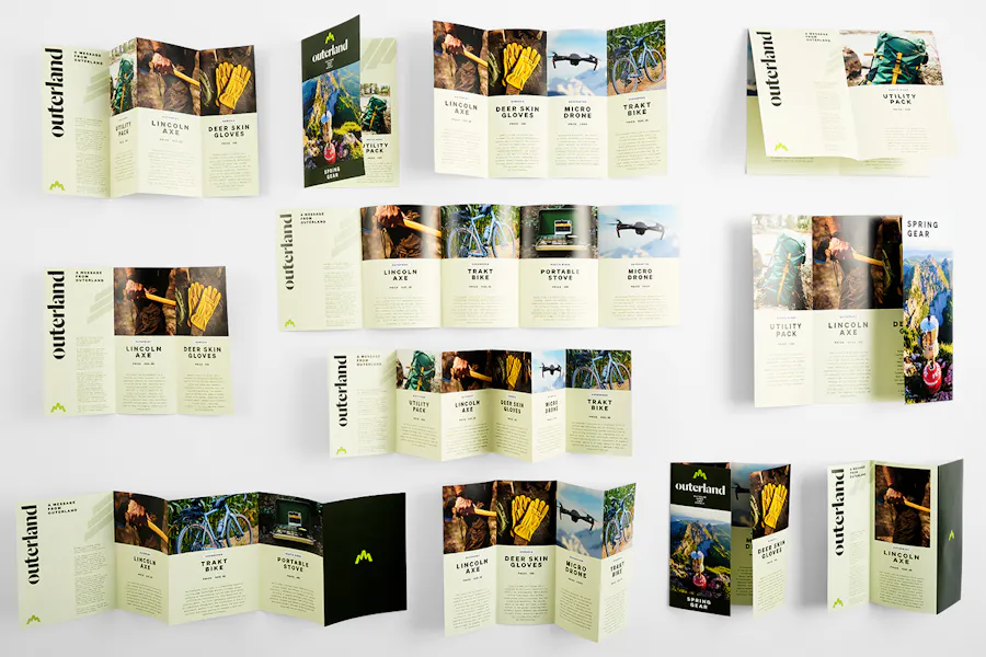A collection of custom brochures unfolded and printed with product details and imagery for outdoor gear.