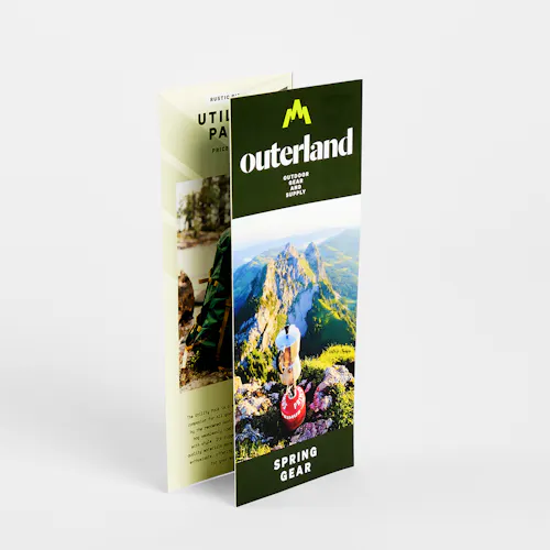 A Z fold brochure standing and printed with Outerland Outdoor Gear and Supply.