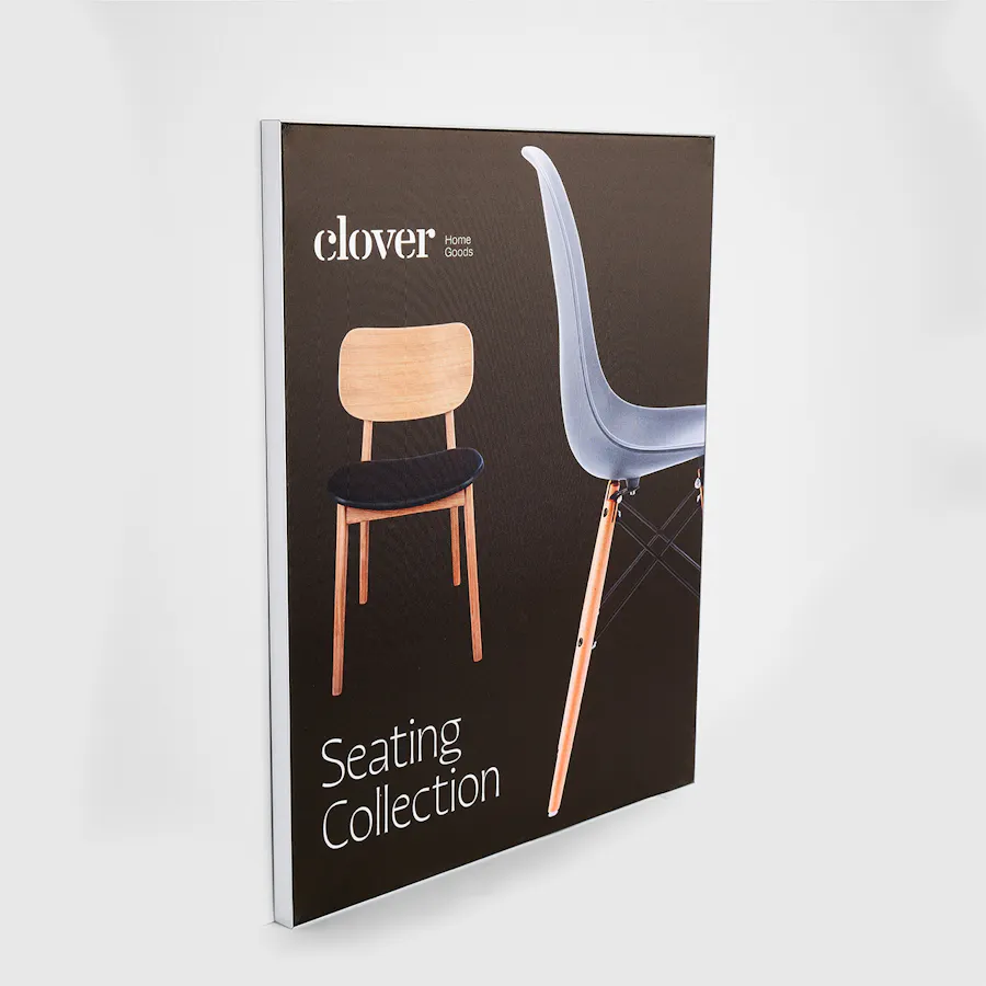 A custom SEG printed with an image of two chairs and Clover Seating Collection in white.