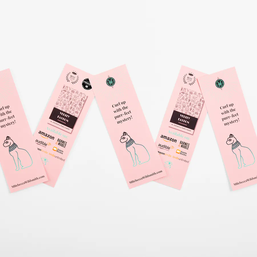 Five bookmarks custom printed with a pink background, a cat graphic and Curl up with the purr-fect mystery in black.