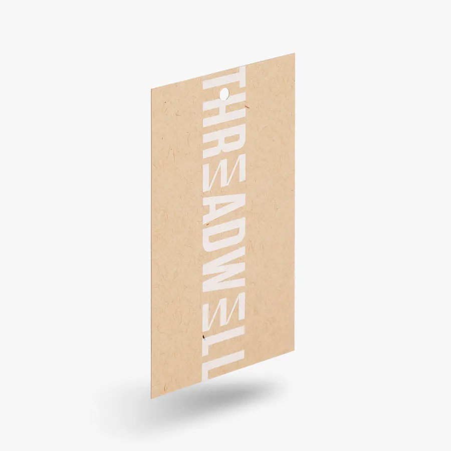 A bookmark designed as a clothing hang tag printed on Kraft paper and with Threadwell in white.