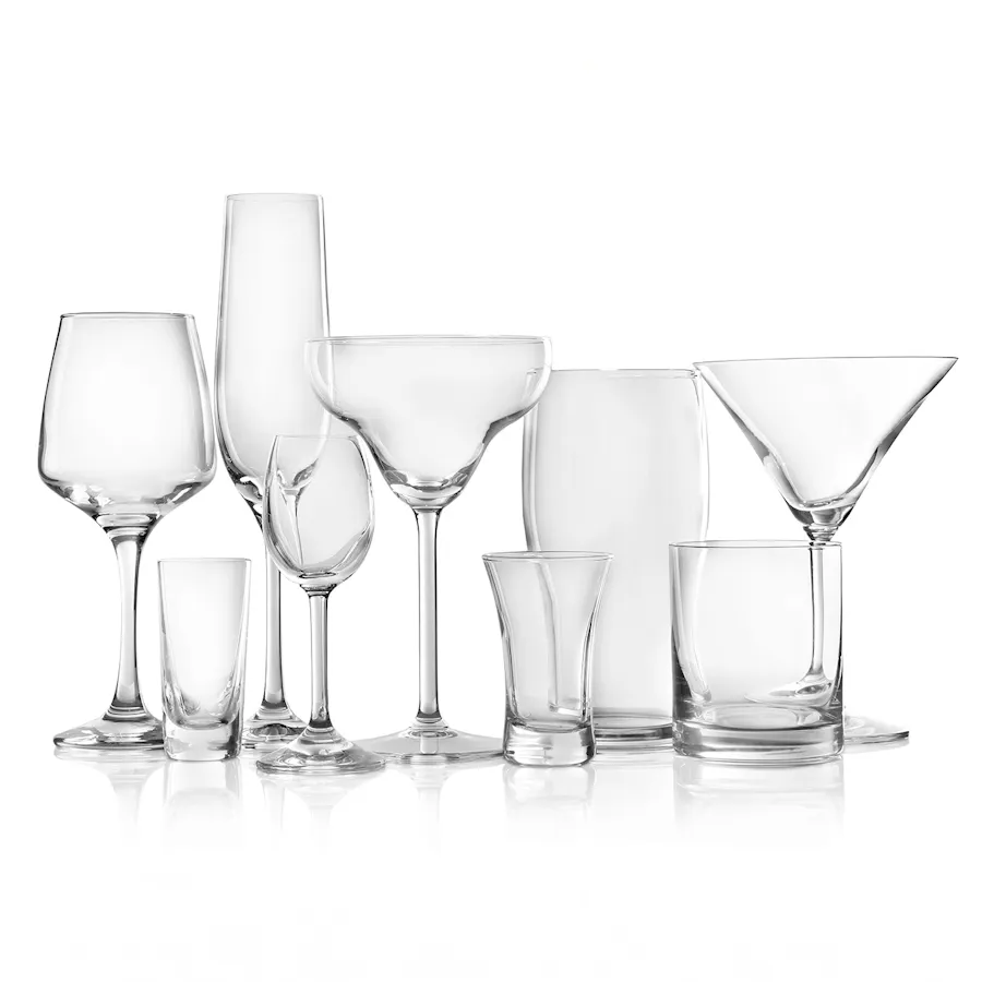 A collection of nine different drinkware glasses in various shapes and sizes.