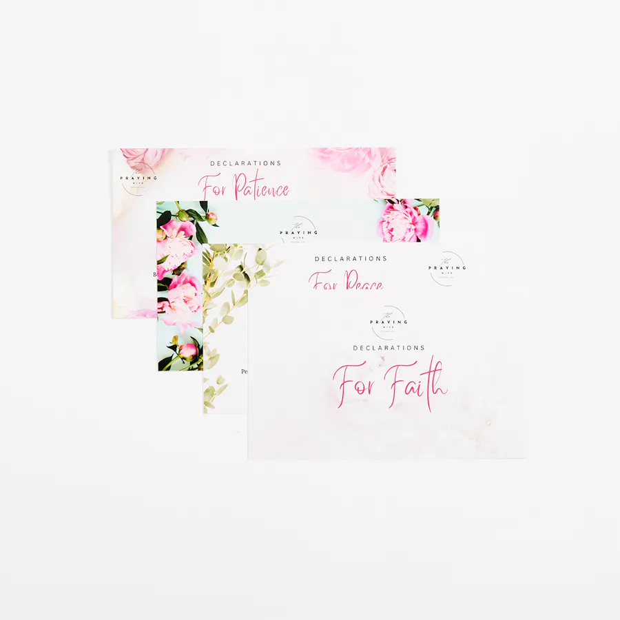 Four fanned-out religious flashcards printed with declarations and pink floral designs.