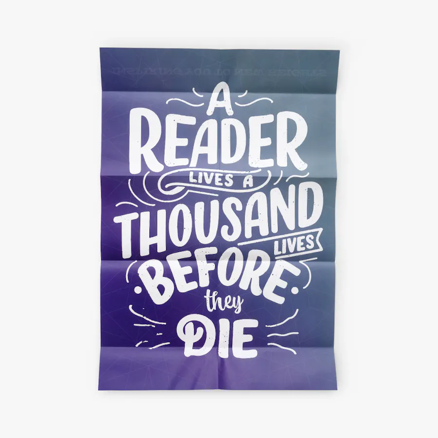 A poster unfolded and printed with a purple background and A Reader Lives a Thousand Lives Before They Die in white.