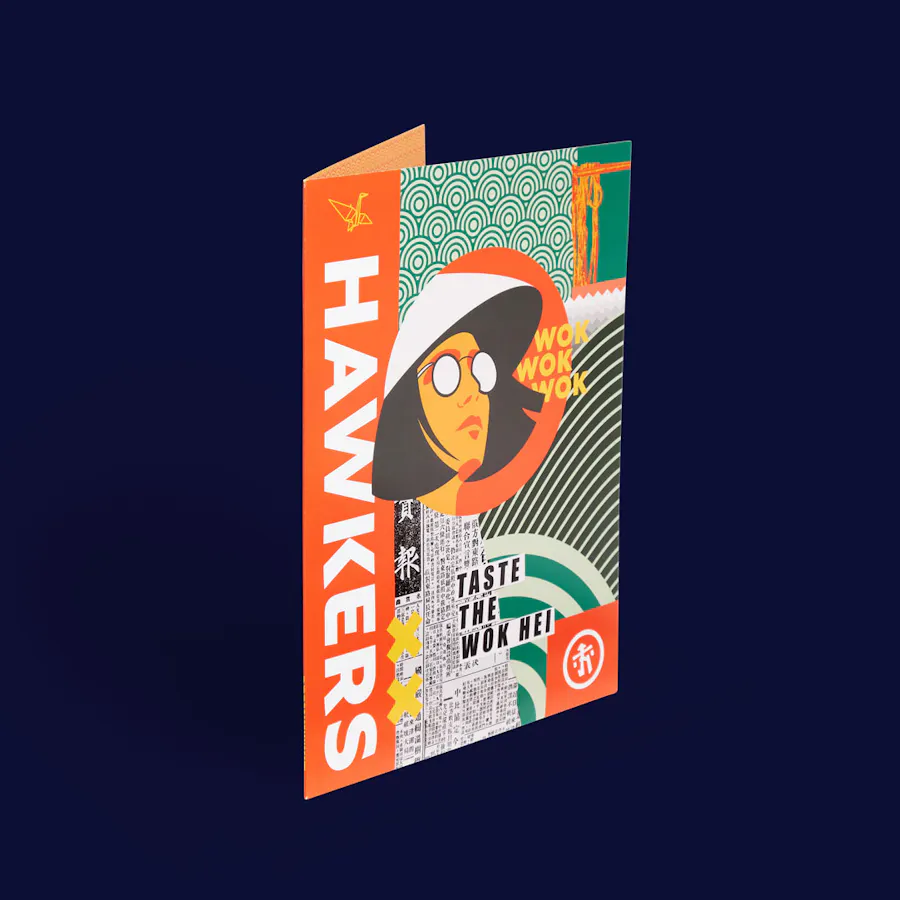 A custom pocket folder printed with an orange, green, white and black design and Hawker printed down the left side.