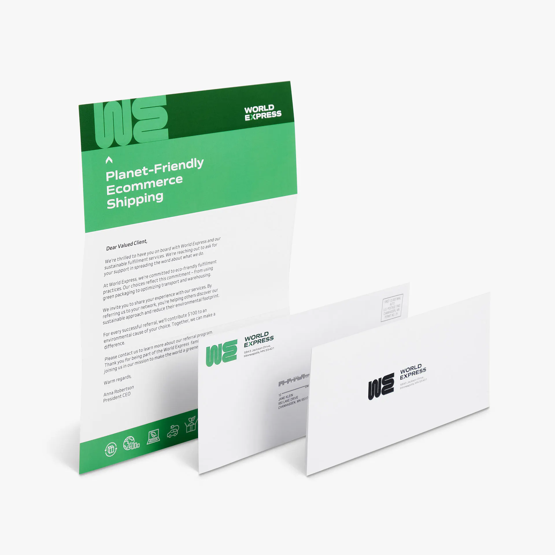 A letter mailer, envelope and reply envelope printed with a World Express design in shades of green.