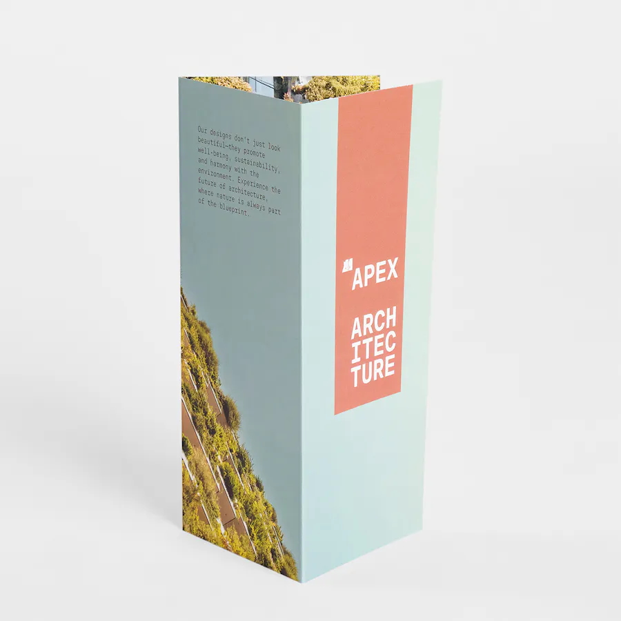 A brochure standing open with Apex Architecture in white and Pantone Color of the year 2025 Mocha Mousse accents.