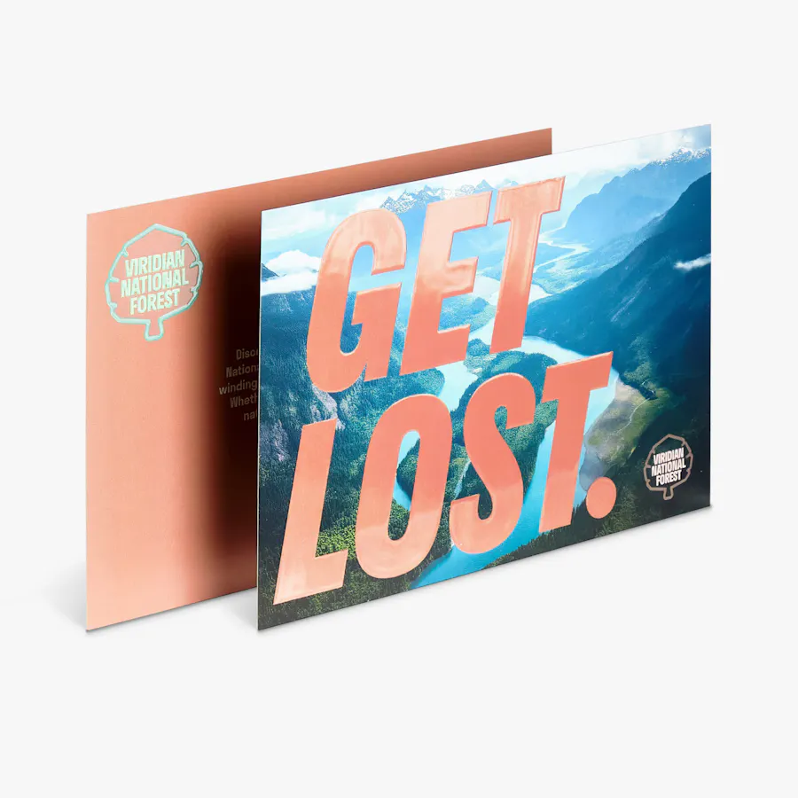 Two postcards printed with national forest imagery and Get Lost with a raised finish.