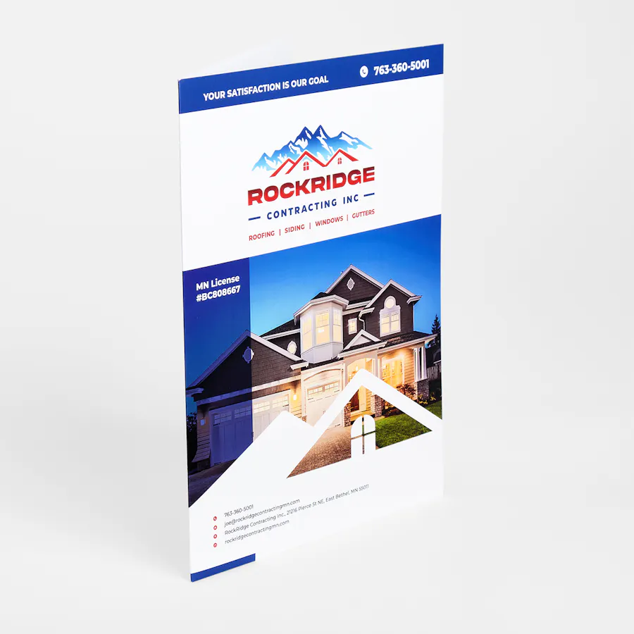 A custom pocket folder printed with imagery and messaging for a contracting company.
