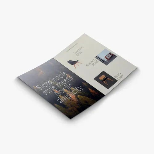 Silver Gloss Raised Foil Brochure A raised foil brochure laying open with silver foil lettering and chair images.