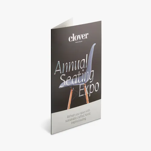 Silver Gloss Raised Foil Brochure A raised foil brochure standing open with silver raised foil accents on the front.