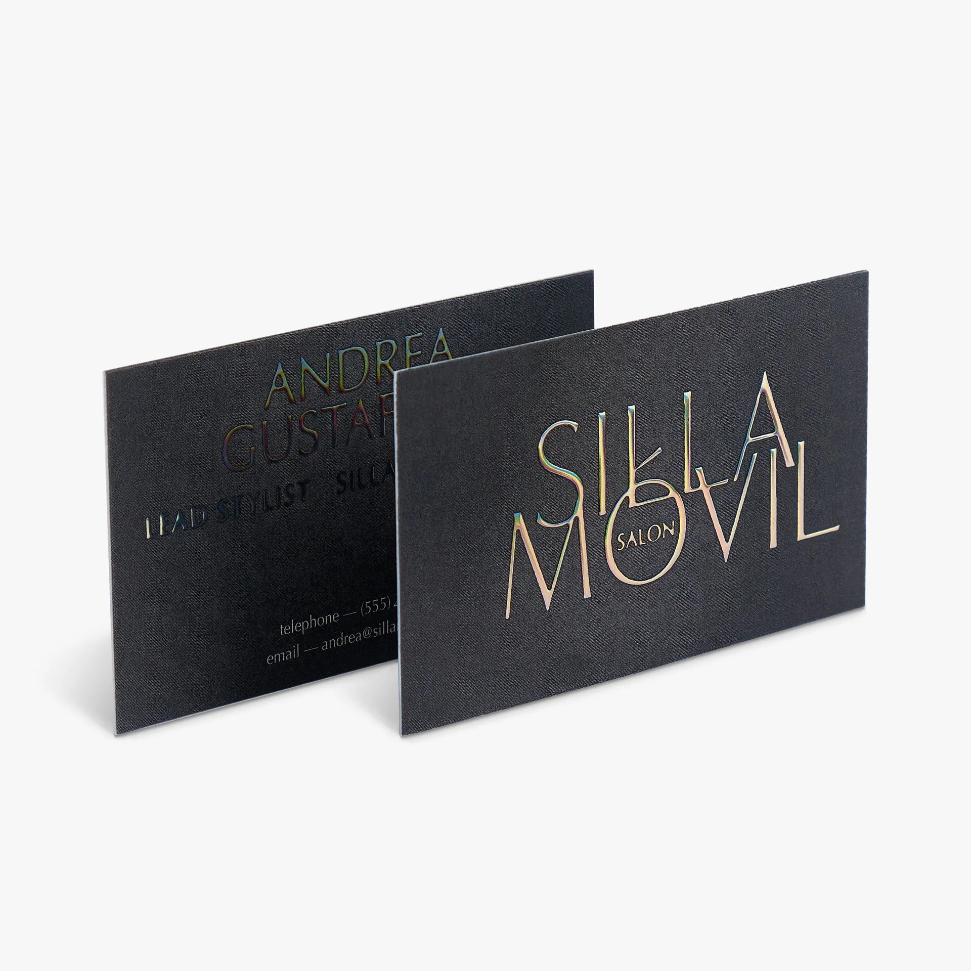 Two business cards overlapping each other and printed with holographic raised foil.